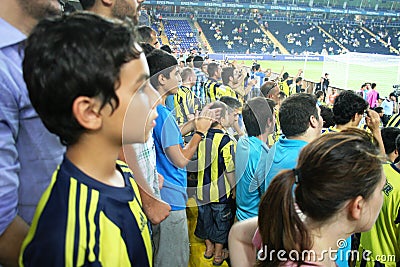 Cheering fans in soccer stadium Editorial Stock Photo