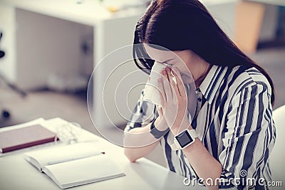 Cheerless nice woman having flu Stock Photo