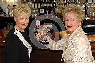 Cheers in bar Stock Photo