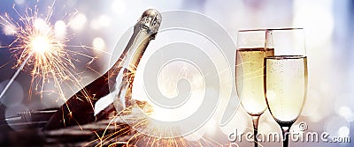 Cheers with a bottle of champagne for a new year Stock Photo