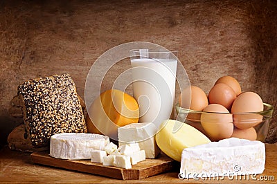 Cheese, bread, milk and eggs Stock Photo