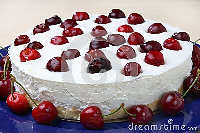 Cheese cake with fresh cherries Stock Photo