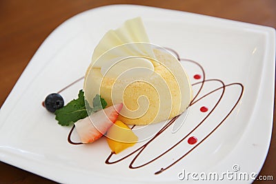 Cheese cake with fruits Stock Photo