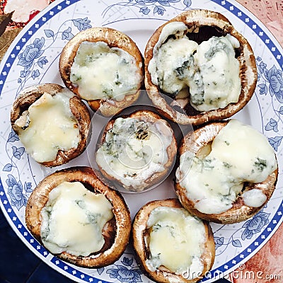 Cheese filled mushrooms Stock Photo