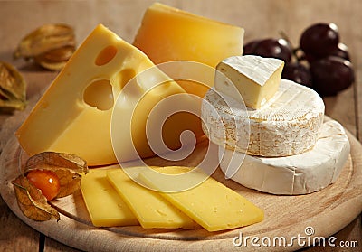 Cheese and fruits Stock Photo