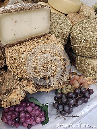 Cheese with grapes Stock Photo