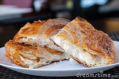 Cheese pie plate in Serbian style - Burek sa sirom Stock Photo