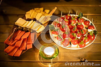 Cheese Platters at candlelight Stock Photo