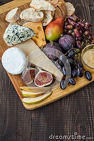 Cheese, prosciutto and pear Stock Photo
