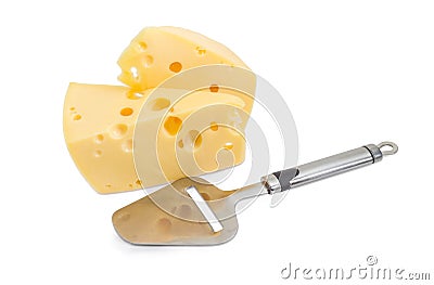 Cheese slicer against the semi-hard cheese Stock Photo