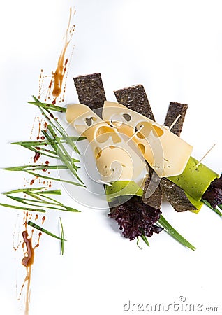 Cheese snack with tofu, green pepper, nori leaves on a wooden tray Stock Photo