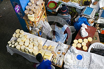 Cheese stall in Central food market of Urubamba, City of the Sacred Valley in Cuzco. Editorial Stock Photo