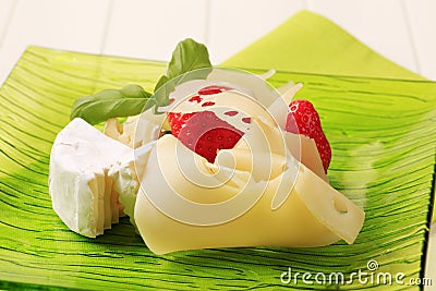 Cheese and strawberries Stock Photo