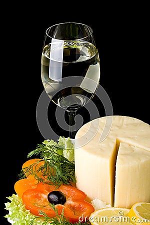 Cheese with vegetables and wine Stock Photo