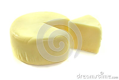 Cheese wheel with a piece of cheese Stock Photo