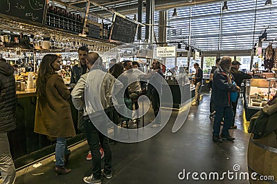 Cheese, wine, pasta outlets at the Bacalan market in Bordeaux Editorial Stock Photo