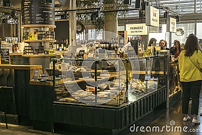 Cheese, wine, pasta outlets at the Bacalan market in Bordeaux Editorial Stock Photo
