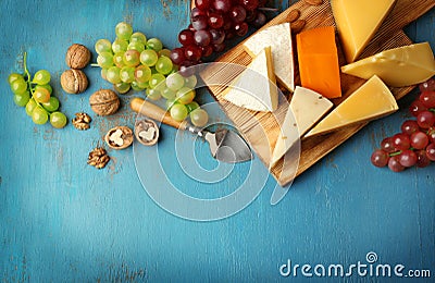 Cheeseboard, grape and nuts Stock Photo