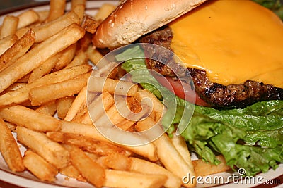 Cheeseburger with fries Stock Photo