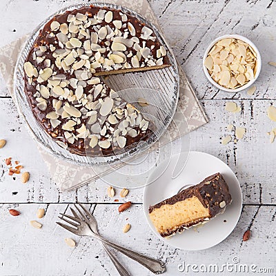 Cheesecake with nuts and caramel. cheesecake snickers. Caramel cake. Top View of Caramel Peanuts Cheesecake Stock Photo