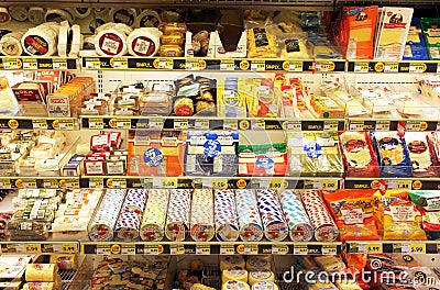 Cheeses on shelves Editorial Stock Photo