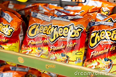 Cheetos Flamin` chips at store Editorial Stock Photo