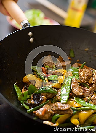 Chef cooking wok Stock Photo