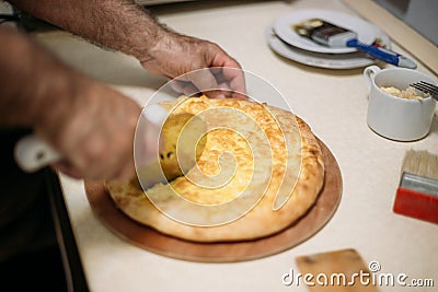 Chef Cuts Delicious Khachapuri Ready To Pieces Stock Photo