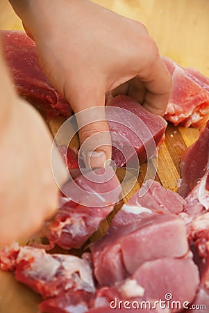 Chef cutting meat Stock Photo