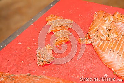 Chef Cutting salmon fish Stock Photo