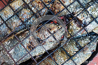 The chef grilled fish in a Chinese restaurant Stock Photo