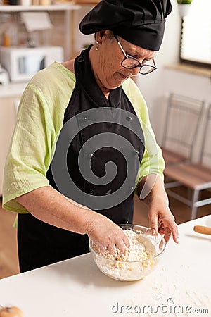 Chef hand in wheat flour Stock Photo