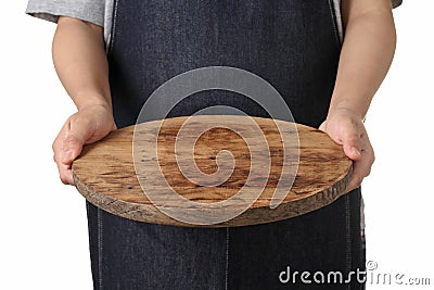 Chef holding wooden cuttingboard on white background Stock Photo