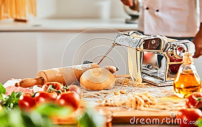 Chef making homemade pasta in a pizzeria Stock Photo