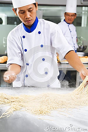 Chef making noodle Stock Photo