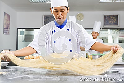 Chef making noodle Stock Photo