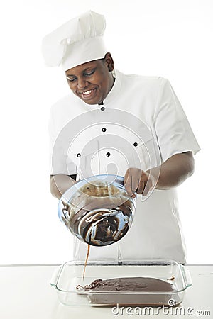 Chef Pouring Batter Stock Photo