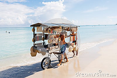 Chef prepares a giant seafood paella on beach Varadero near sunbathing tourists Editorial Stock Photo