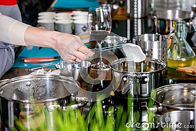 Chef prepares ingredients for tuna tartare. Master class in the kitchen. The process of cooking. Step by step. Tutorial. Close-up Stock Photo