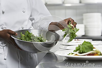 Chef Preparing Salad Stock Photo