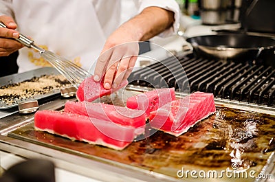 Chef preparing tuna steaks Stock Photo