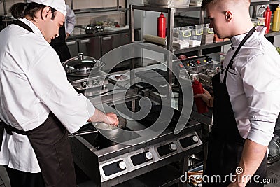 Chef sharing experience skills secrets tips Stock Photo