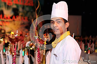 Chef smiling at new year gala dinner buffet Stock Photo