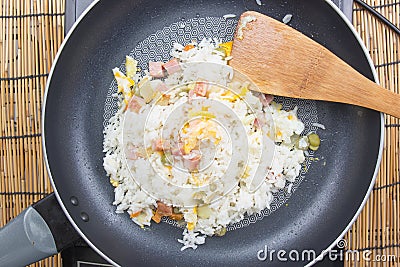 Chef stir fried rice on pan Stock Photo