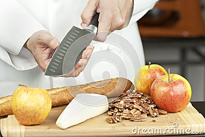 Chef Tests Knife Sharpness Stock Photo