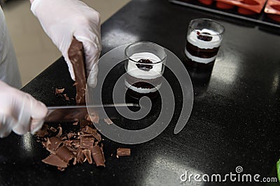 Chef is Using Knife Chop Dark Chocolate Bars Stock Photo