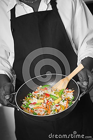 chef with wok Stock Photo