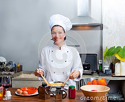 Chef woman portrait in the kitchen Stock Photo