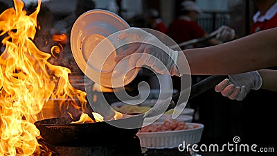 Chef at work - Flambe cooking Stock Photo