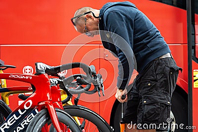 Chelm, Lubelskie, Poland - July 31, 2022: 79 Tour de Pologne, A technician is preparing the bikes for the race Editorial Stock Photo